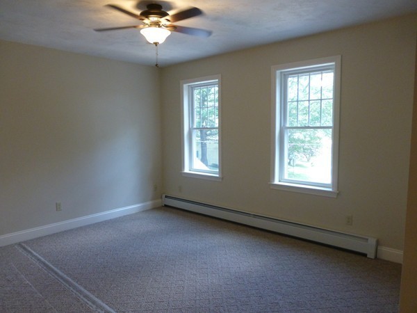 Lot 1 Baker Hill Road Spencer, MA 01562 - Photo 23 of 28 an empty room with a window and a fan