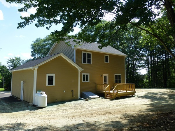 Lot 1 Baker Hill Road Spencer, MA 01562 - Photo 27 of 28 a front view of a house with a yard