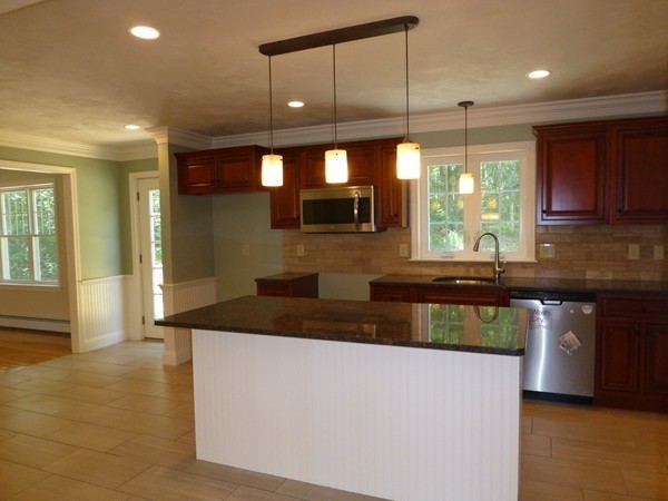 Lot 1 Baker Hill Road Spencer, MA 01562 - Photo 6 of 28 a kitchen with kitchen island a sink appliances and cabinets
