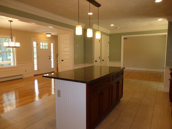 Lot 1 Baker Hill Road Spencer, MA 01562 - Photo 7 of 28 a bathroom with a double vanity sink a large mirror and shower