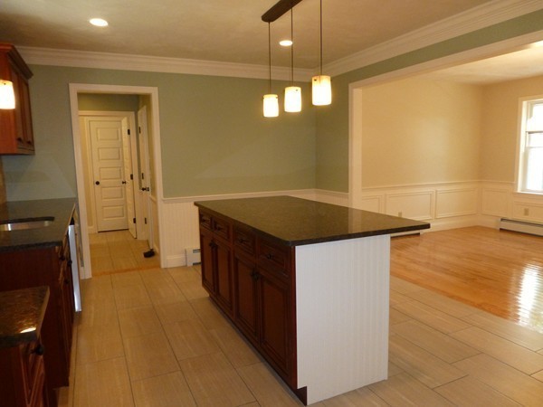 Lot 1 Baker Hill Road Spencer, MA 01562 - Photo 9 of 28 a kitchen with stainless steel appliances granite countertop a sink and a refrigerator