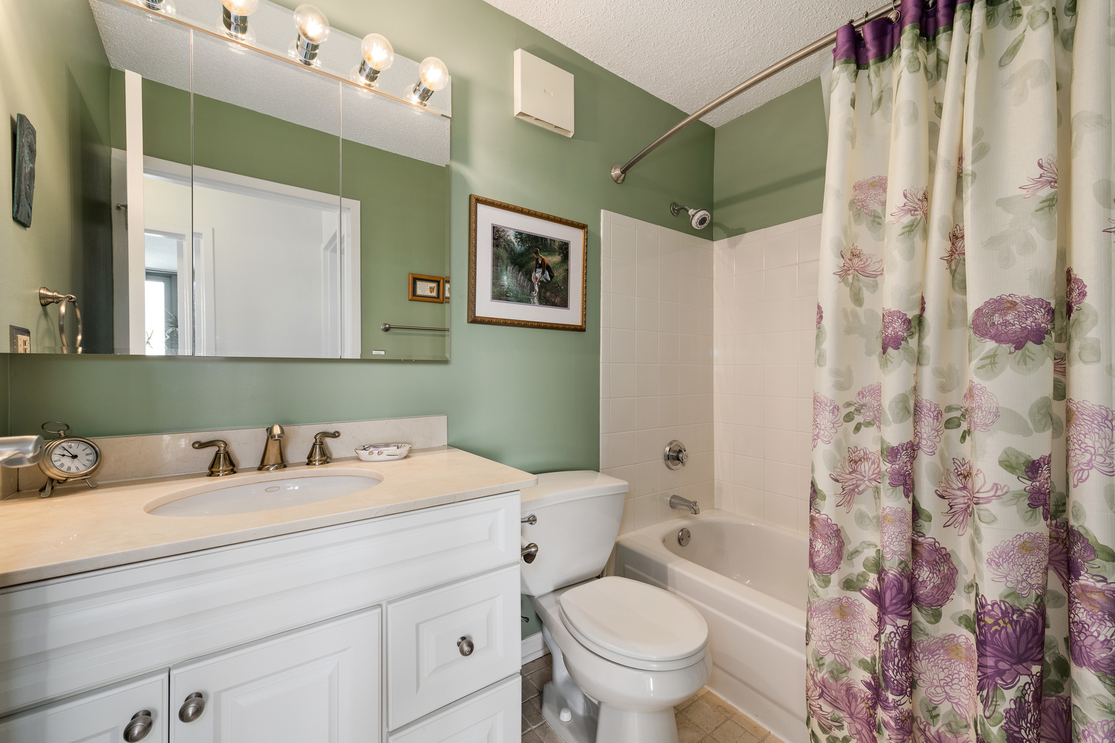 111 West Maple Street, Unit 1601 Chicago, IL 60610 - Photo 16 of 24 a bathroom with a sink toilet and shower