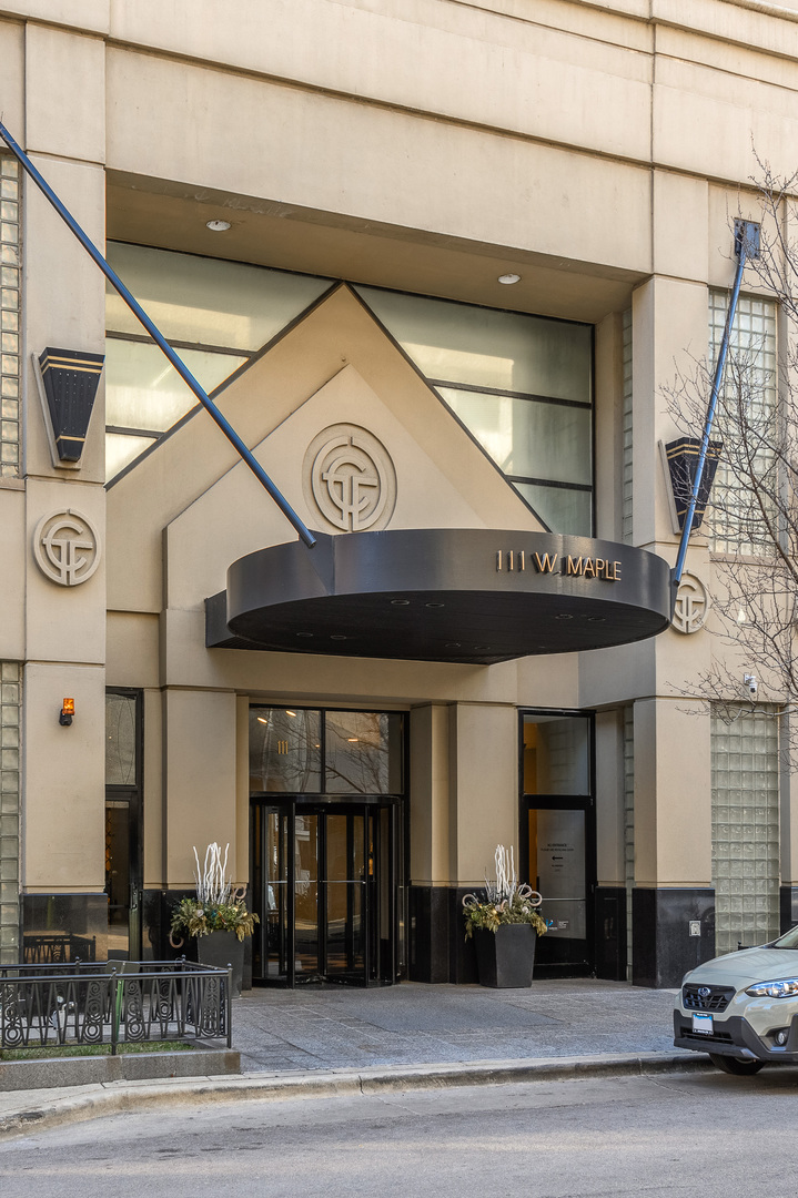 111 West Maple Street, Unit 1601 Chicago, IL 60610 - Photo 2 of 24 a view of a building with a street