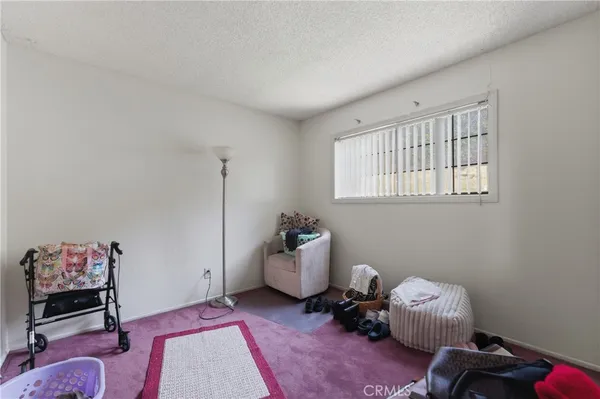 a room with toys and a wooden floor