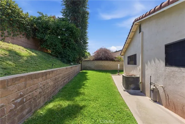a view of an house with backyard space