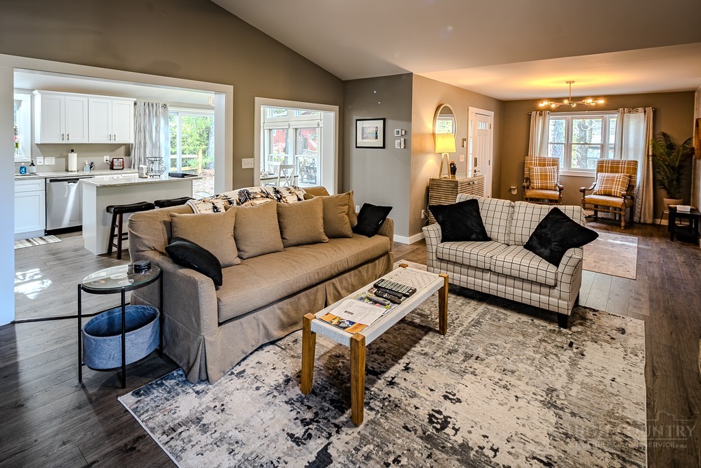 88 Trillium Road Newland, NC 28657 - Photo 14 of 44 a living room with furniture and a large window