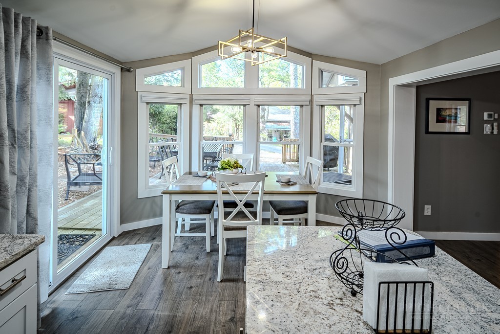 88 Trillium Road Newland, NC 28657 - Photo 23 of 44 a view of a dining room with furniture window and outside view
