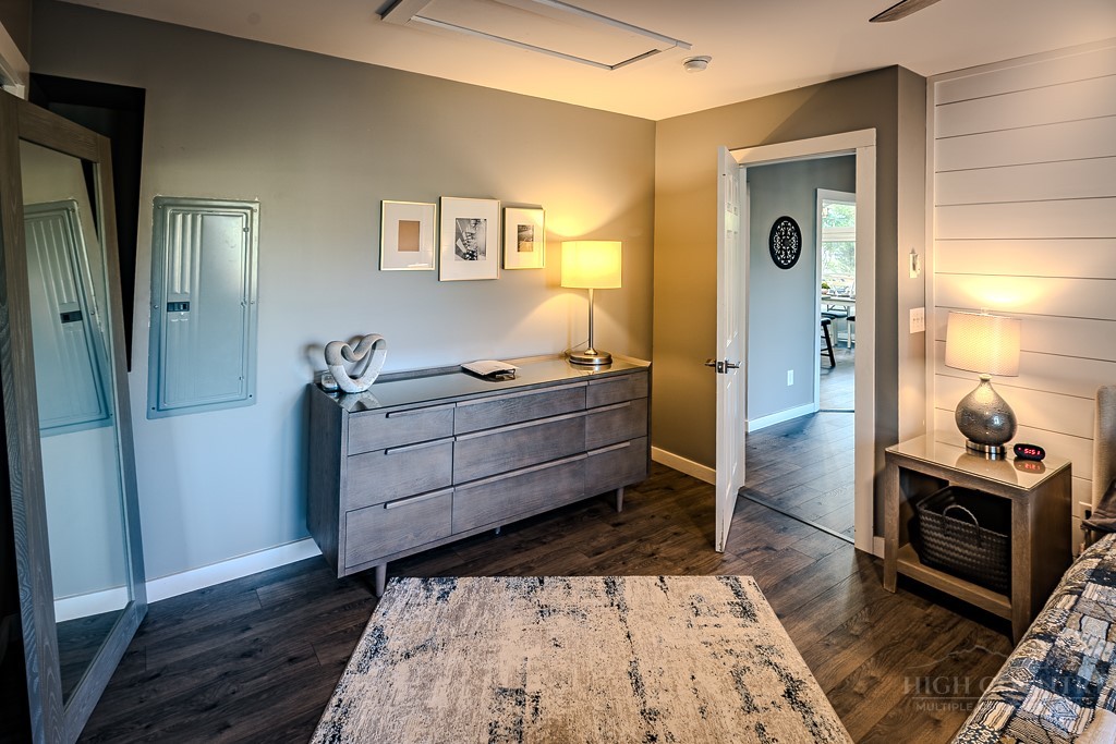 88 Trillium Road Newland, NC 28657 - Photo 31 of 44 a bed room with a bed and a mirror