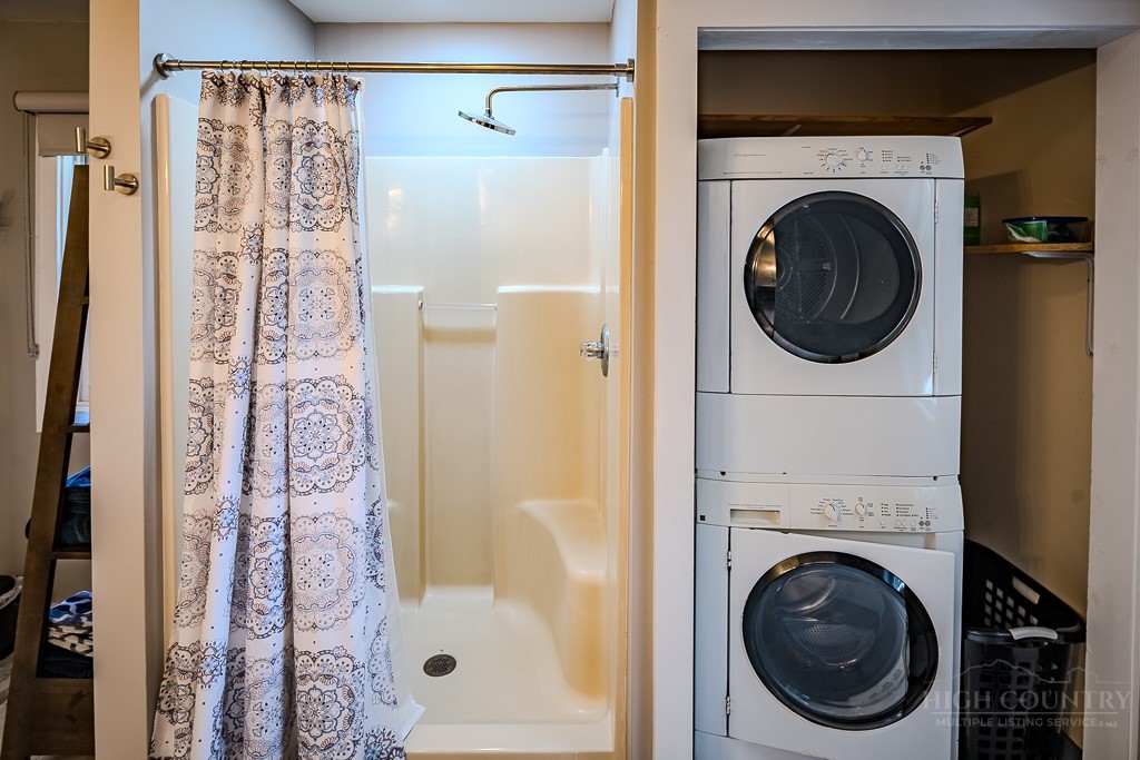 88 Trillium Road Newland, NC 28657 - Photo 34 of 44 a view of a bedroom with washer and dryer