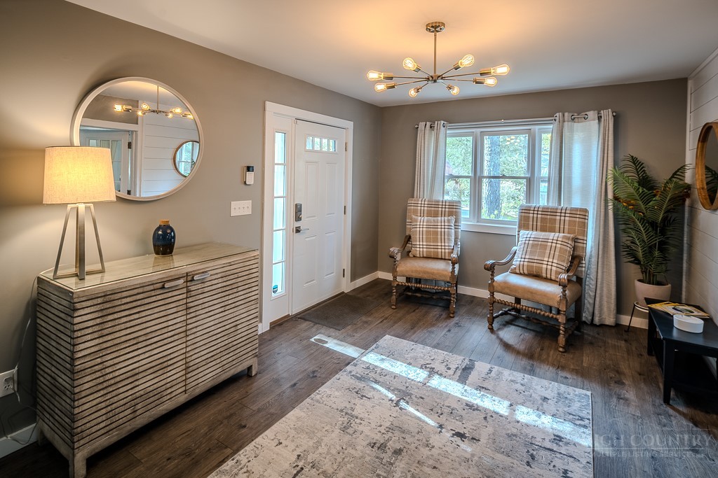 88 Trillium Road Newland, NC 28657 - Photo 5 of 44 a living room with furniture and a flat screen tv