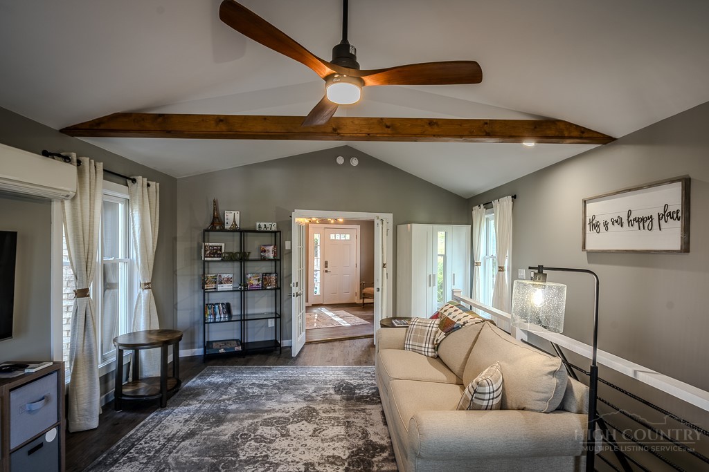 88 Trillium Road Newland, NC 28657 - Photo 9 of 44 a living room with furniture and a flat screen tv