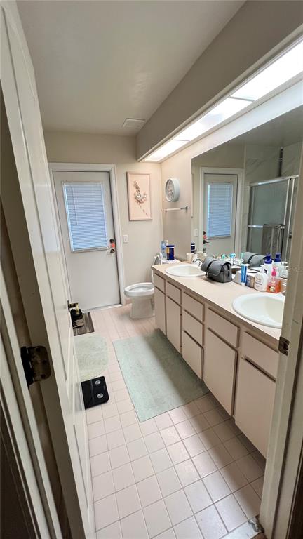 4305 Northwest 55 Way Gainesville, FL 32606 - Photo 13 of 14 a room with a bed and a dresser