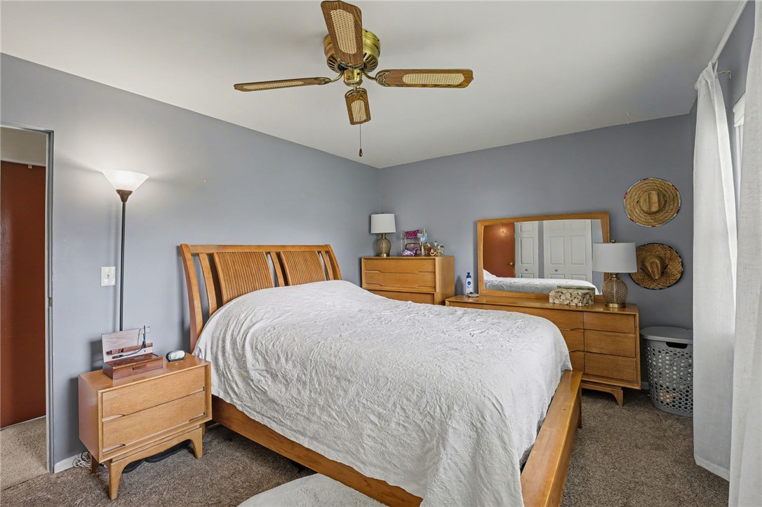 4919 Silver Arrow Drive Riverside, OH 45424 - Photo 30 of 57 This inviting bedroom provides a comfortable retreat with soft carpet and natural light.