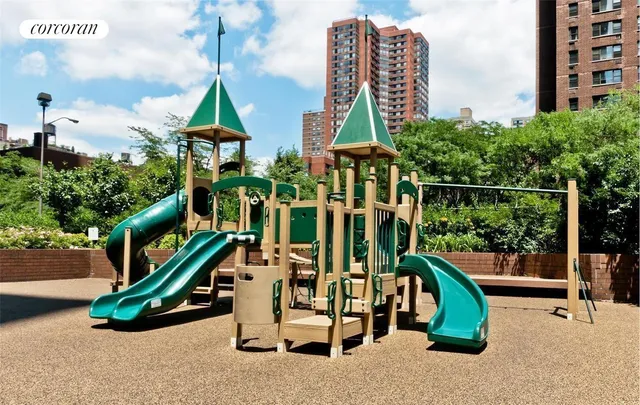 a front view of a building with yard and outdoor space