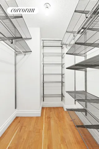 a bathroom with a sink a mirror and shower