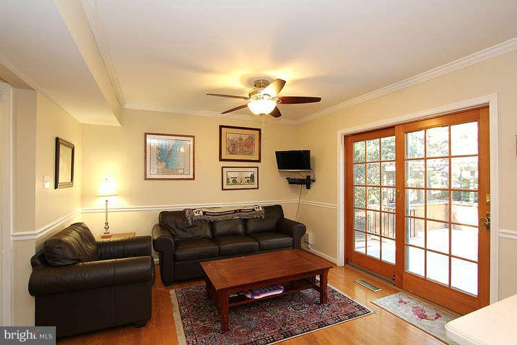 11525 Pine Cone Court Reston, VA 20191 - Photo 11 of 30 a living room with furniture and a window