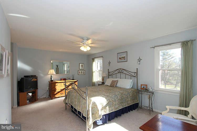 11525 Pine Cone Court Reston, VA 20191 - Photo 15 of 30 a bedroom with a bed and window