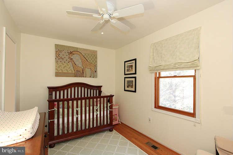 11525 Pine Cone Court Reston, VA 20191 - Photo 20 of 30 a view of entryway with a window and a ceiling fan