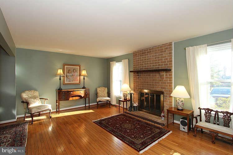 11525 Pine Cone Court Reston, VA 20191 - Photo 3 of 30 a living room with furniture rug and window