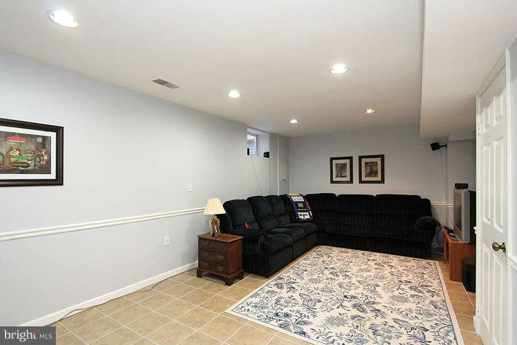 11525 Pine Cone Court Reston, VA 20191 - Photo 23 of 30 a living room with furniture and a couch