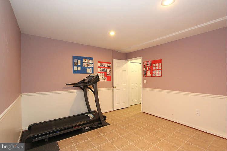 11525 Pine Cone Court Reston, VA 20191 - Photo 26 of 30 a view of a room with gym equipment