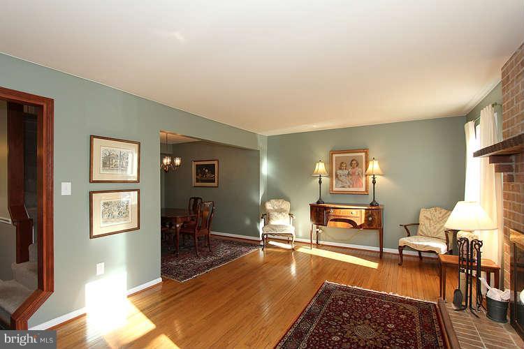 11525 Pine Cone Court Reston, VA 20191 - Photo 4 of 30 a living room with furniture and a wooden floor