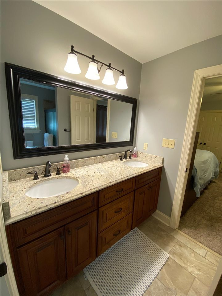 7532 South Tanglewild Drive Raleigh, NC 27613 - Photo 30 of 30 Jack and Jill Bathroom