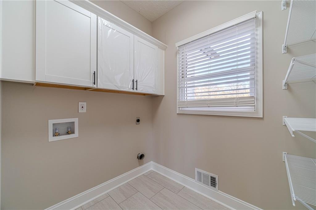 710 Youth Jersey Road Monroe, GA 30655 - Photo 23 of 53 a view of an empty room with a window