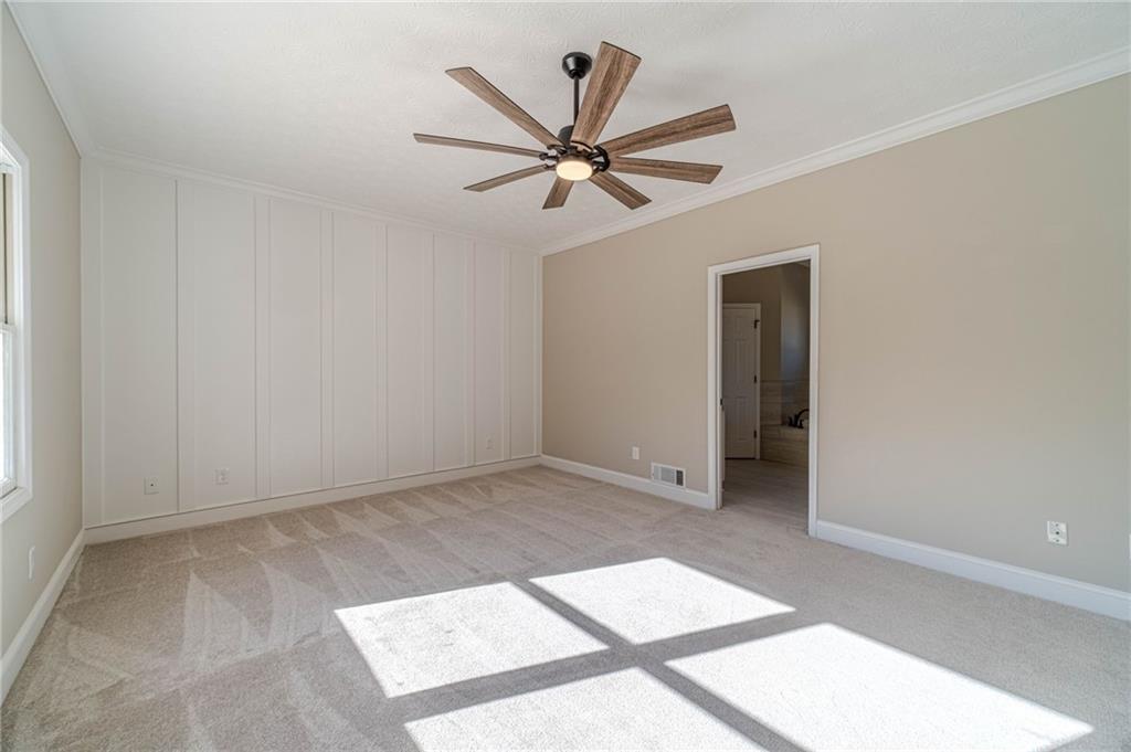 710 Youth Jersey Road Monroe, GA 30655 - Photo 25 of 53 a view of a livingroom with a ceiling fan and window