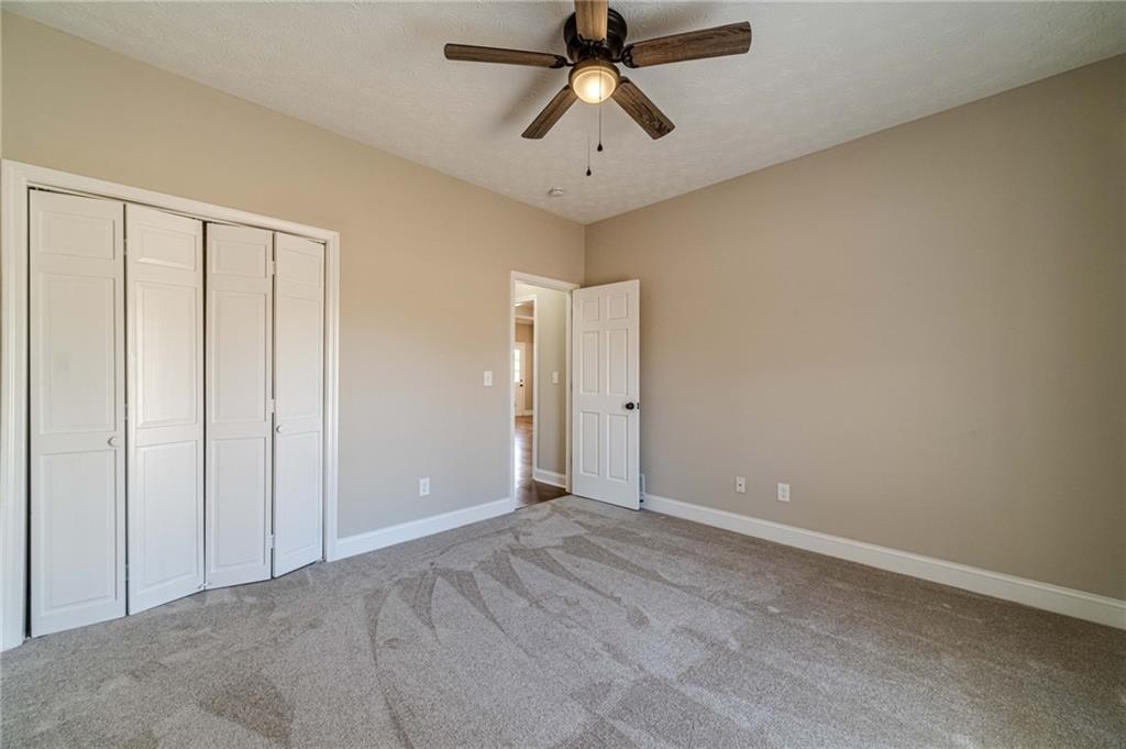 710 Youth Jersey Road Monroe, GA 30655 - Photo 38 of 53 wooden floor in an empty room