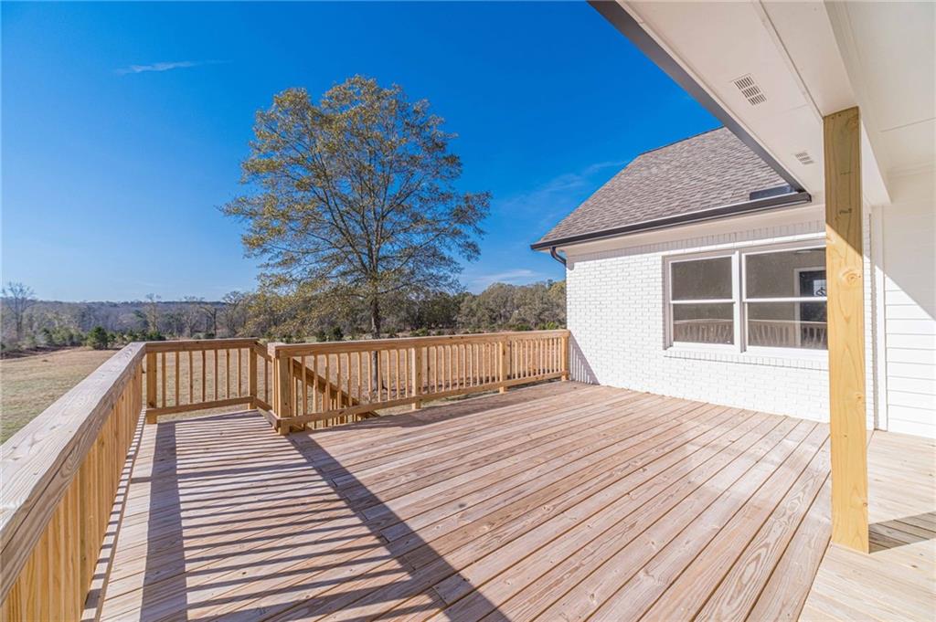 710 Youth Jersey Road Monroe, GA 30655 - Photo 47 of 53 a view of balcony with wooden floor and fence
