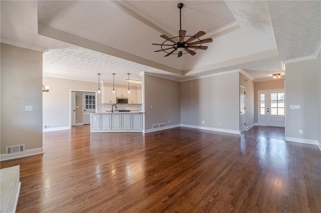 710 Youth Jersey Road Monroe, GA 30655 - Photo 8 of 53 a view of an empty room and wooden floor