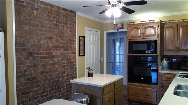 2731 Cedar Grove Road Lebanon, TN 37087 - Photo 10 of 20 Another view of the KITCHEN. The brick wall is the backside of the FIREPLACE.
