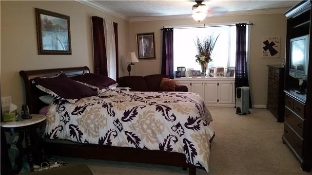2731 Cedar Grove Road Lebanon, TN 37087 - Photo 19 of 20 The 23'x13' MASTER BEDROOM SUITE FEATURES A WALK-IN CLOSET, PLUS AN EXTRA LARGE CLOSET, BAY WINDOW LOCATED ON THE OPPOSITE SIDE OF THE HOME (A SPLIT FLOOR PLAN).