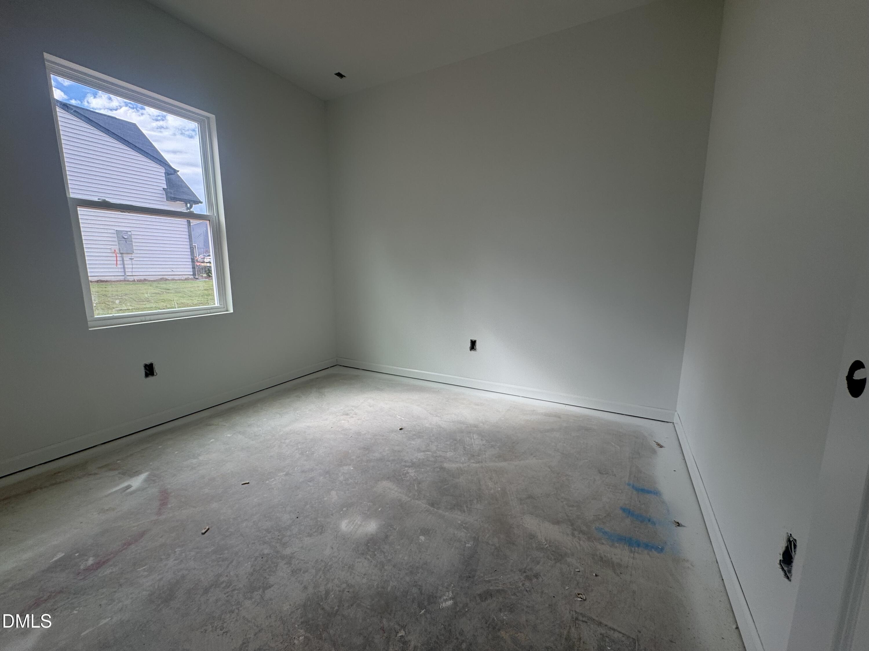 11739 Salers Loop Middlesex, NC 27557 - Photo 19 of 24 an empty room with a empty space and windows