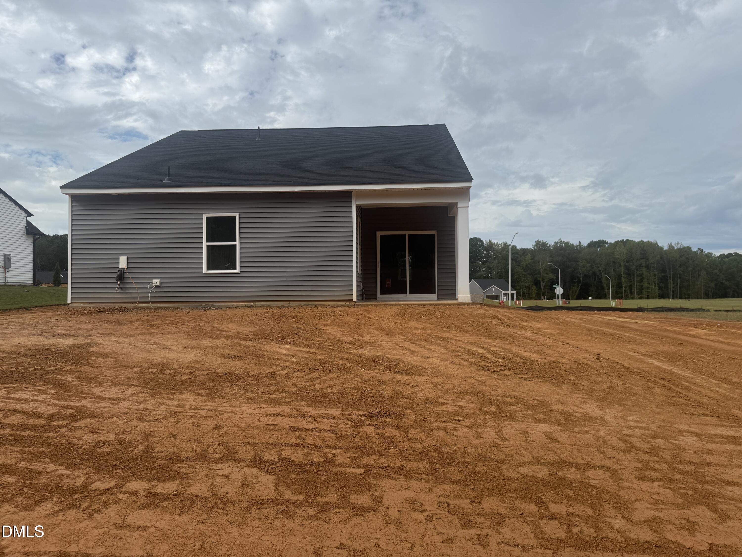 11739 Salers Loop Middlesex, NC 27557 - Photo 22 of 24 a backyard of a house with lots of green space