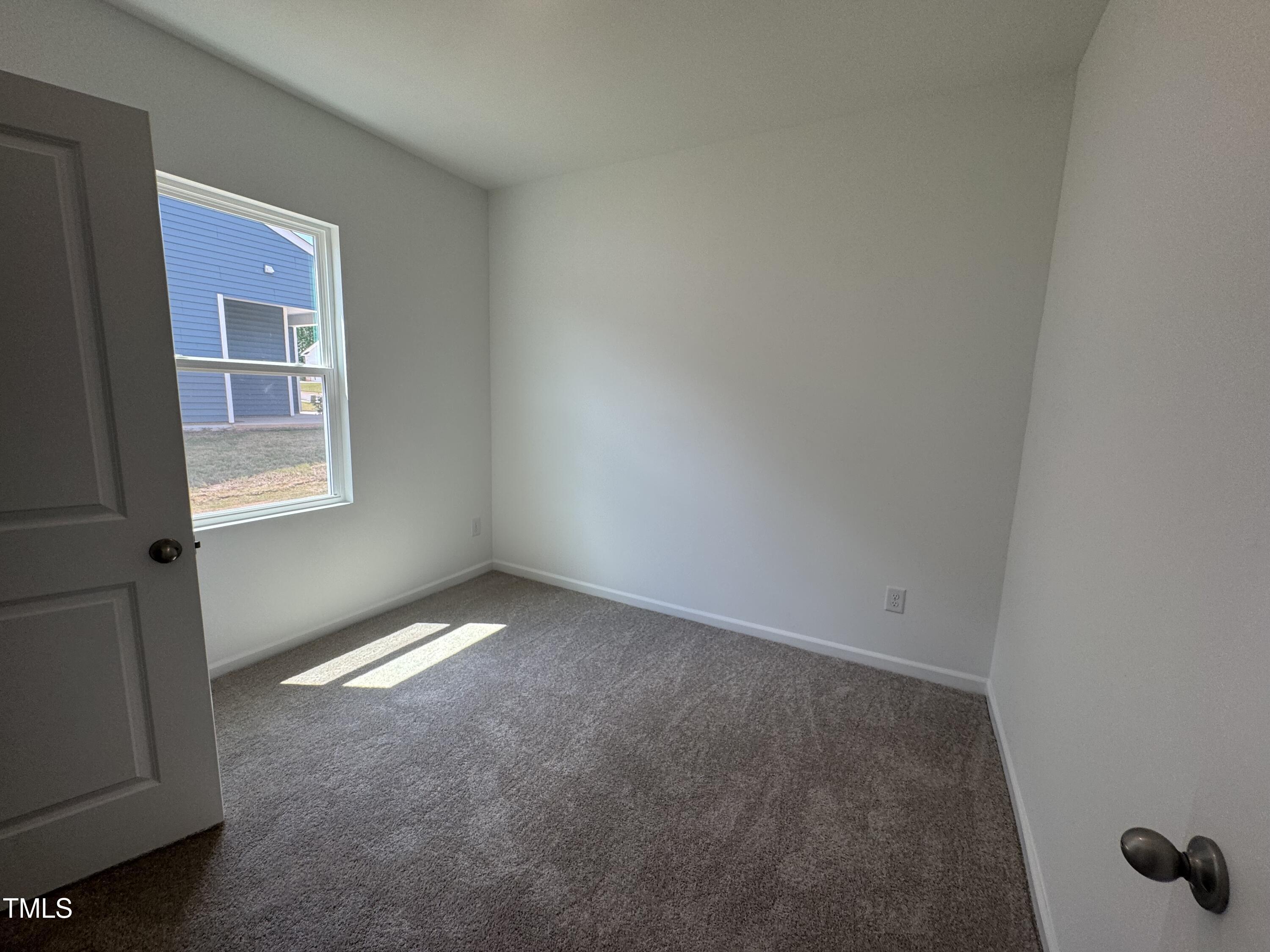 11739 Salers Loop Middlesex, NC 27557 - Photo 6 of 24 an empty room with windows
