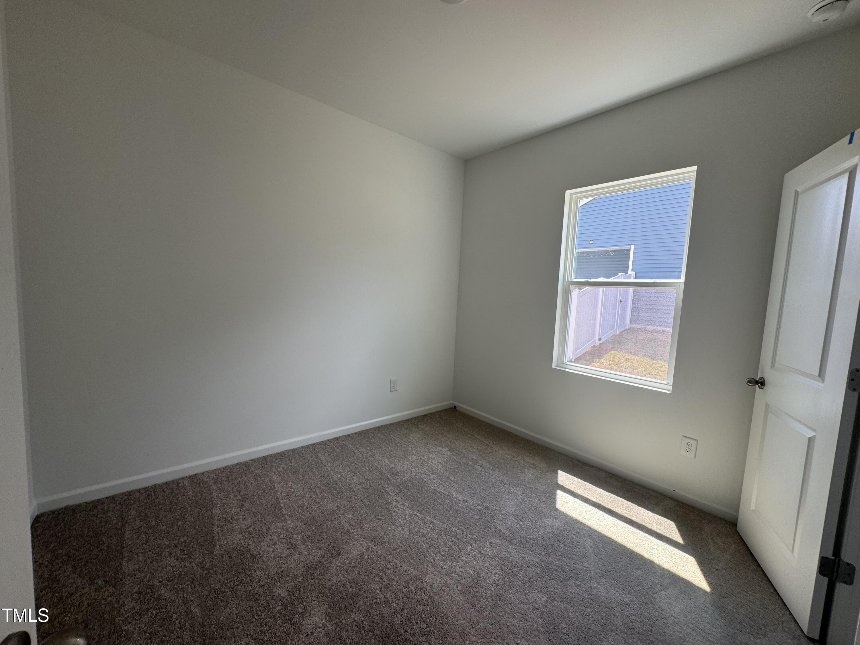 11739 Salers Loop Middlesex, NC 27557 - Photo 7 of 24 an empty room with windows