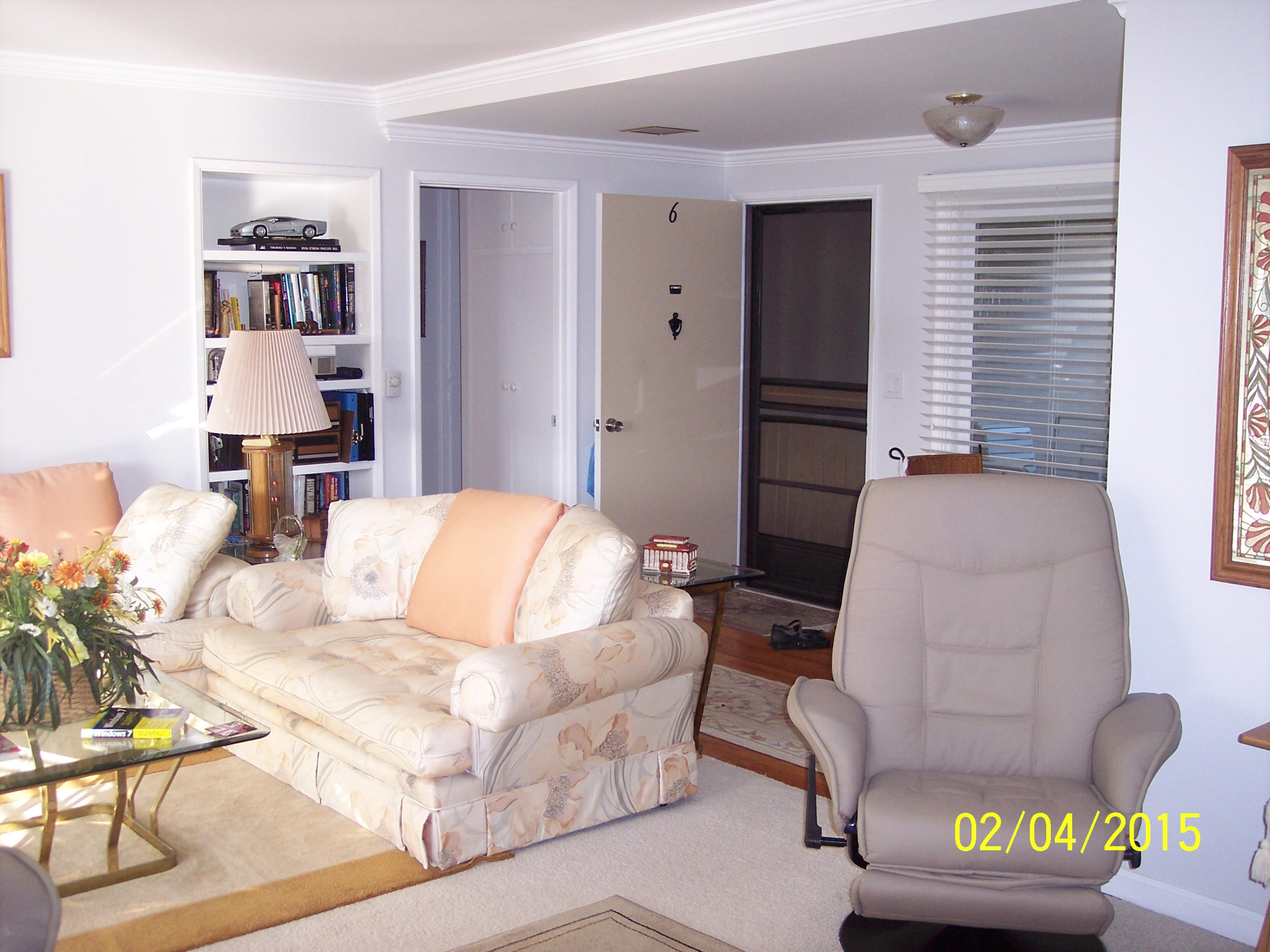 5722 Encina Road, Unit 6 Goleta, CA 93117 - Photo 8 of 22 a living room with furniture and a painting on the wall