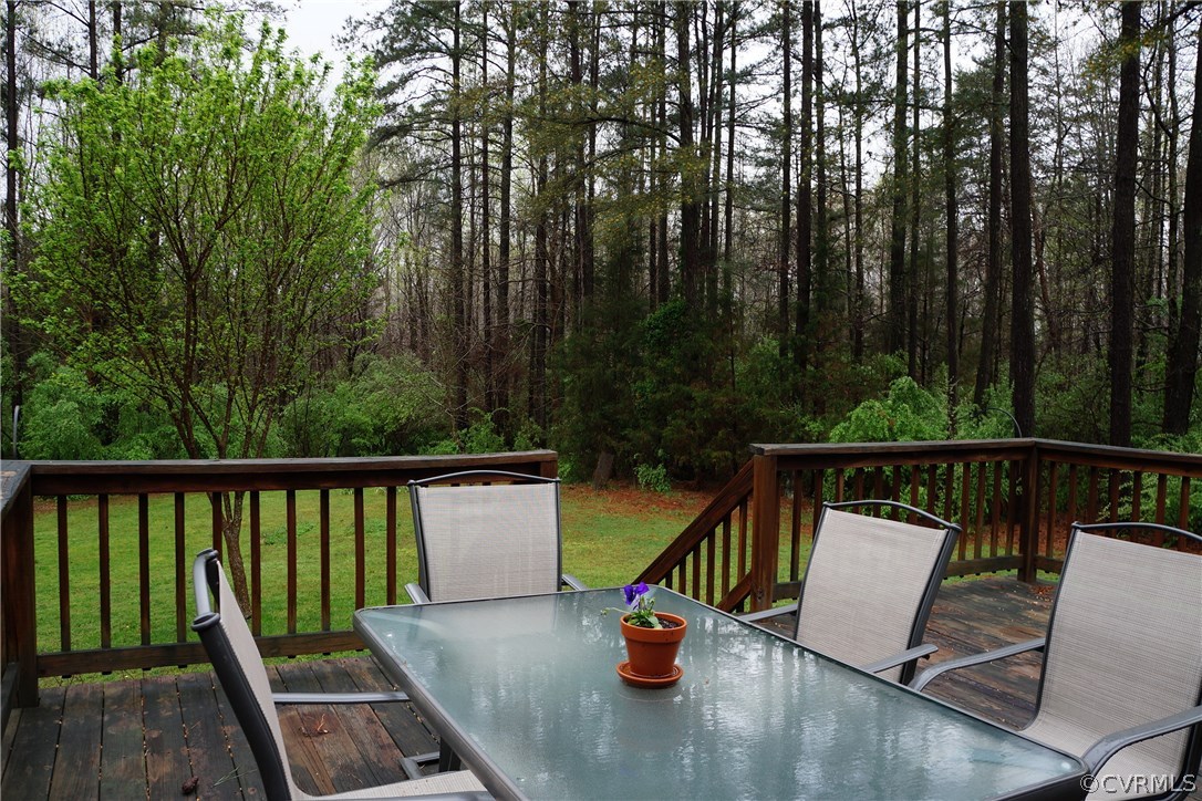 3135 Meherrin Road Meherrin, VA 23954 - Photo 4 of 20 a view of roof deck with two chairs and a table