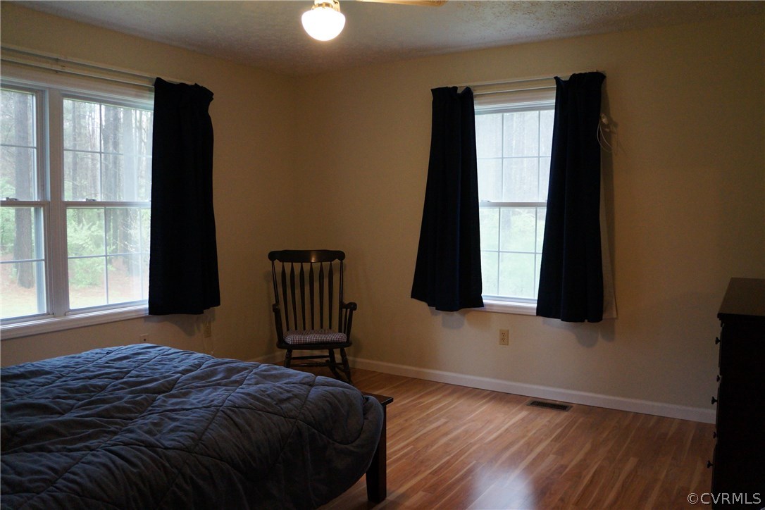 3135 Meherrin Road Meherrin, VA 23954 - Photo 7 of 20 a bedroom with a bed and window