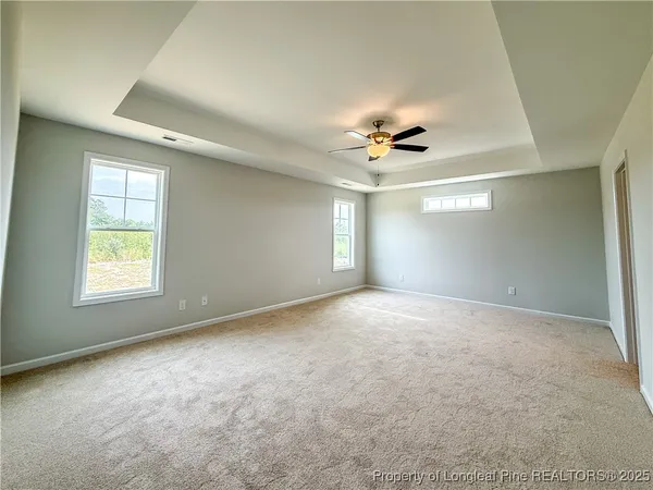 a bathroom with a shower and toilet