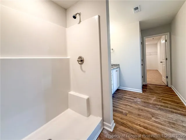 a view of a room with an empty space