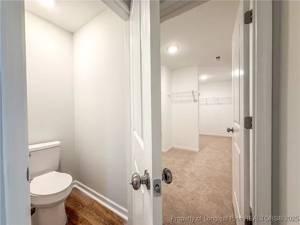 a view of a room with racks on the wall