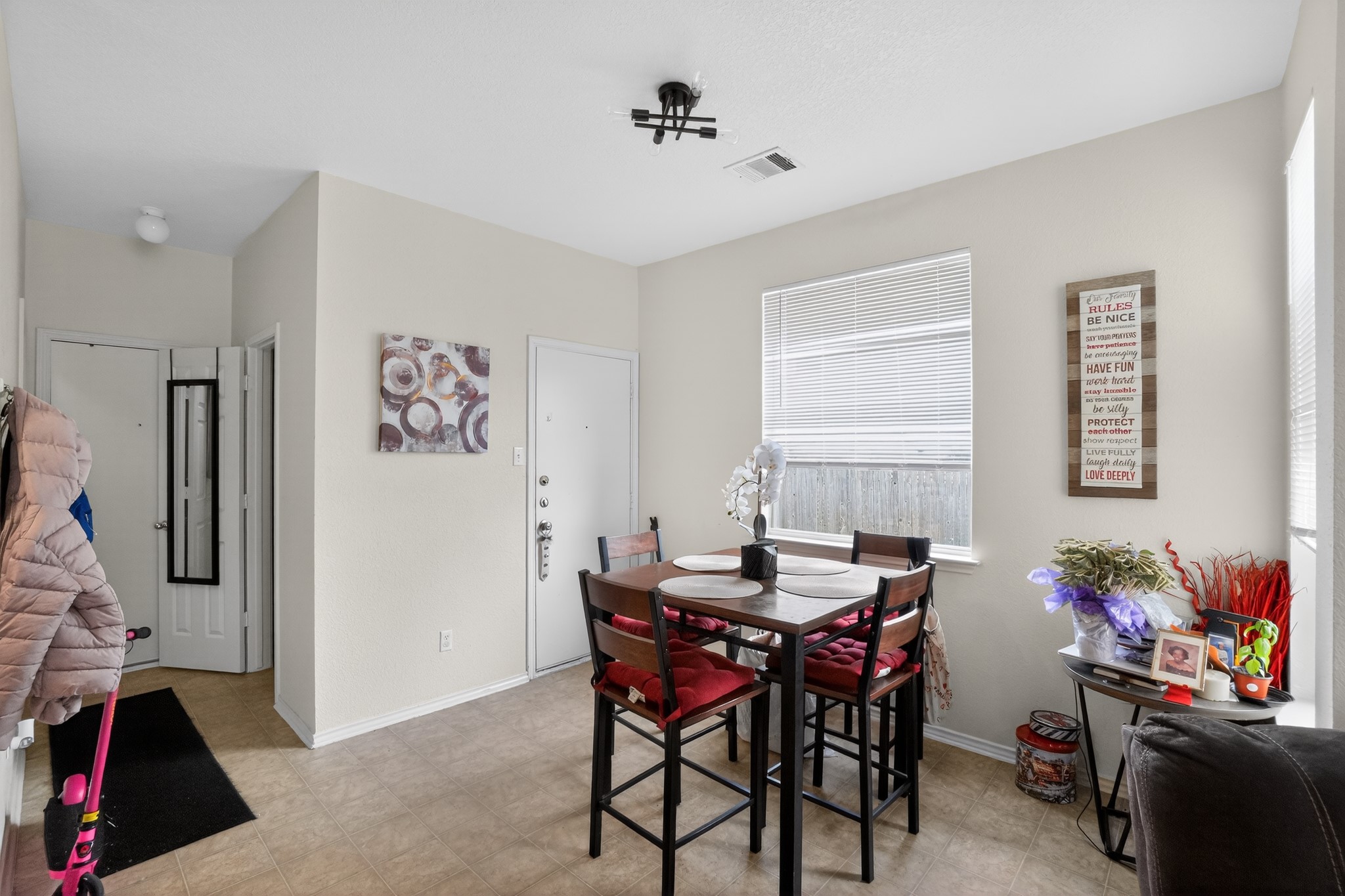 13808 Harris Ridge Boulevard Pflugerville, TX 78660 - Photo 36 of 40 a dining room with furniture and window