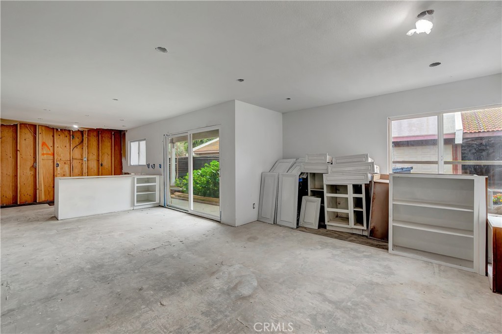 951 South Citron Street, Unit 5 Anaheim, CA 92805 - Photo 1 of 1 a view of a kitchen with furniture and an empty room