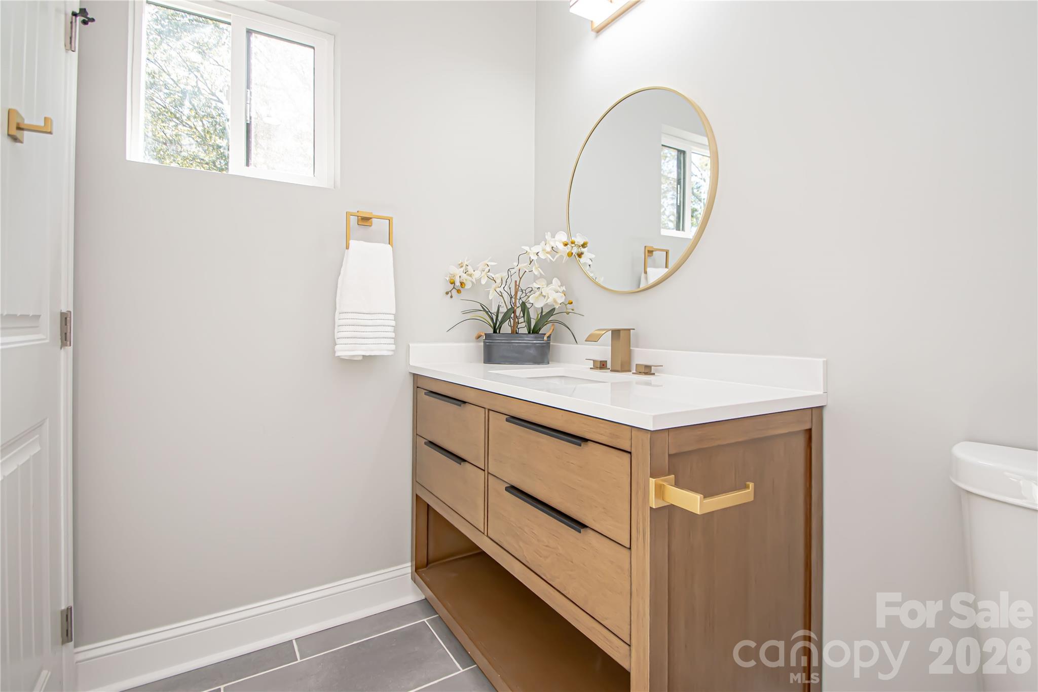728 Sugar Plum Road Chester, SC 29706 - Photo 22 of 47 a bathroom with a sink and a mirror