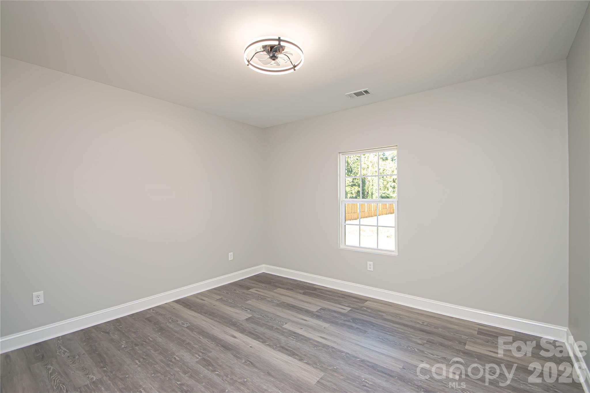 728 Sugar Plum Road Chester, SC 29706 - Photo 25 of 47 an empty room with a window