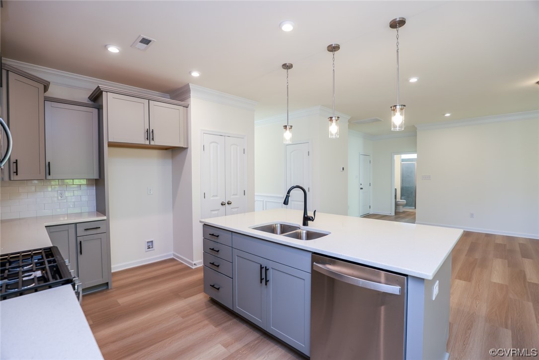 3830 Belspring Road Chester, VA 23831 - Photo 11 of 43 a kitchen with a sink a stove a refrigerator and white cabinets