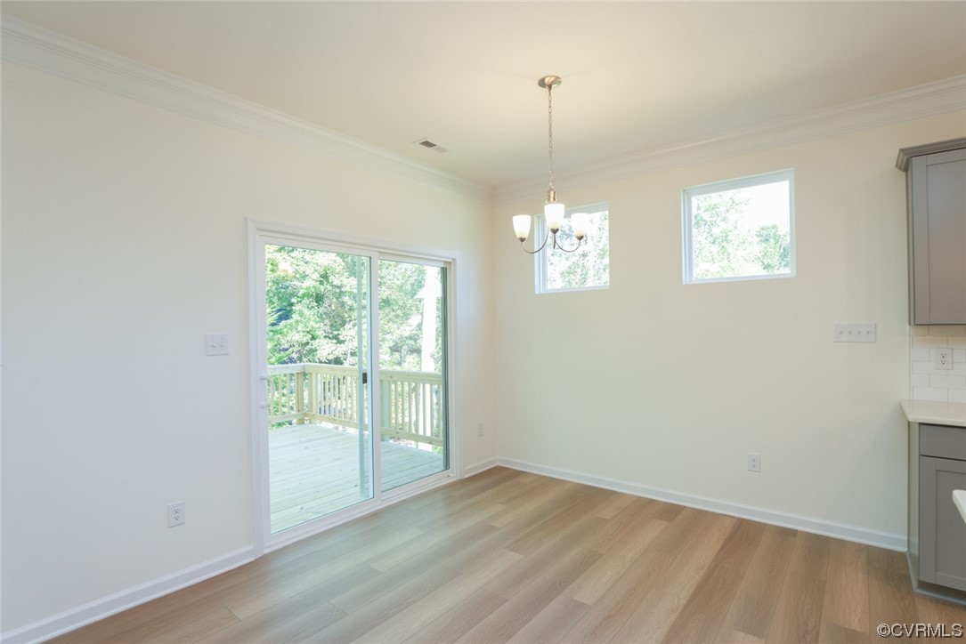 3830 Belspring Road Chester, VA 23831 - Photo 13 of 43 a view of empty room with wooden floor and fan